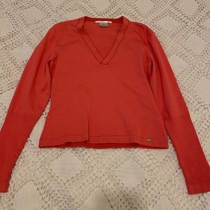 Bright pink NIKE Golf sweater